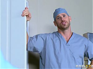 huge-titted mature nurse Julia Ann kneads the patient's massive beef whistle